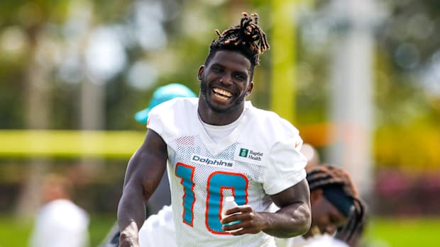 Miami Dolphins wide receiver Tyreek Hill played basketball in LaMelo Ball's Puma shoes.